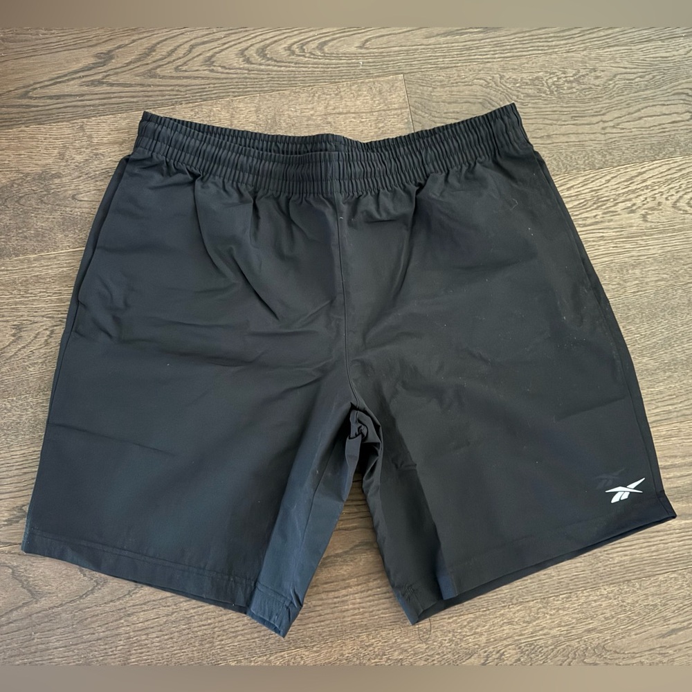 Brand new with tag Reebok ID training utility shorts. Size L, black colour.